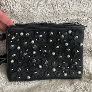 Black Crossbody bag with floral 3-D accents and pearl detail
